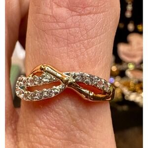 Gold Tone Ribbon Twist Ring with Clear Rhinestones Size 7